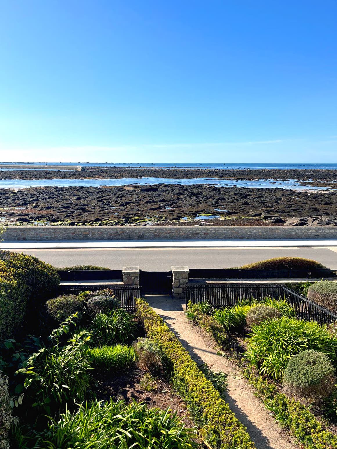 Sea view from An Ti Du, the port of Kérity and Eckmühl lighthouse in the distance.